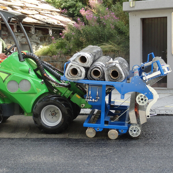 Maschineller Einbau, vollflächig auf gebrochener Emulsion
